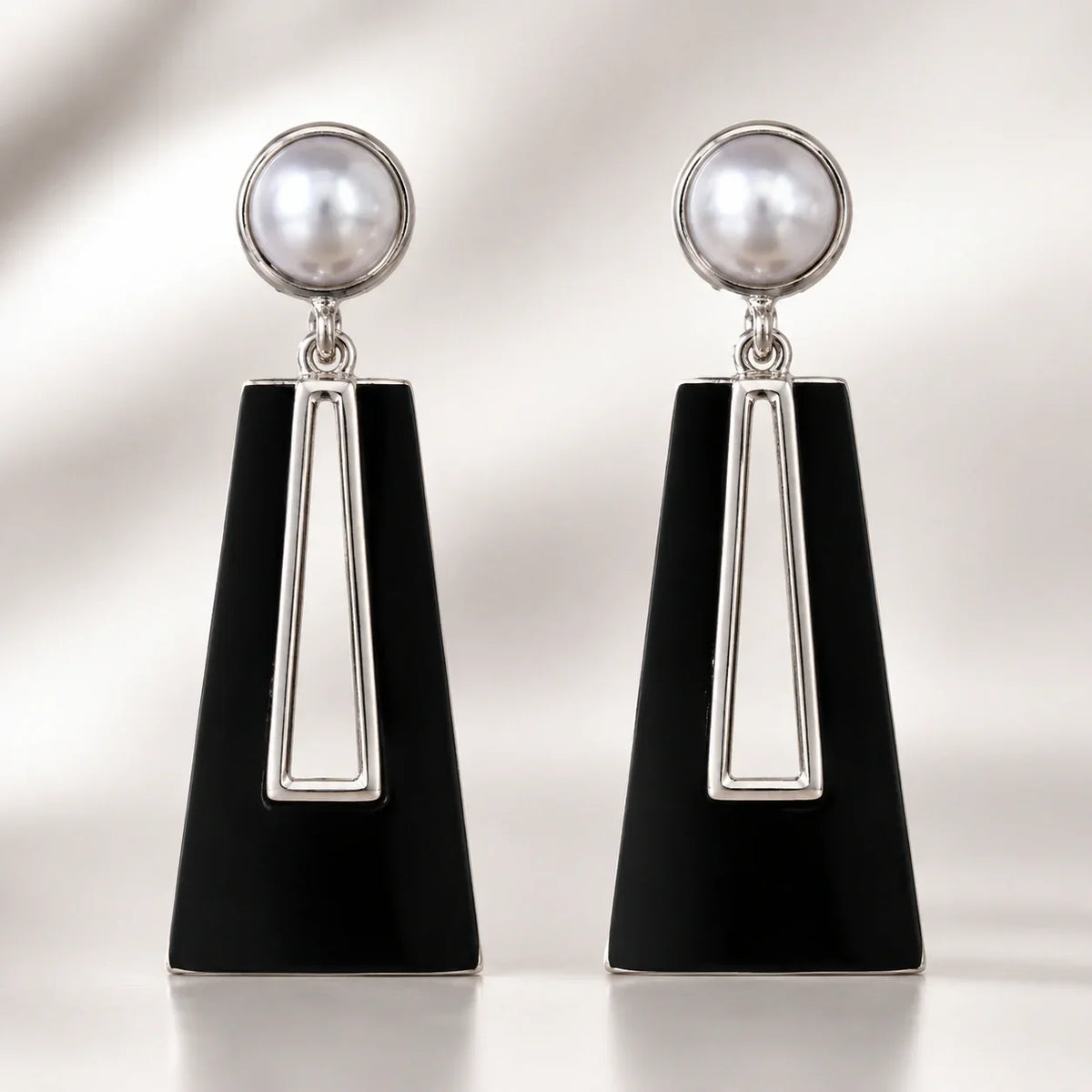 Types of earrings for women guide featuring modern geometric dangle earrings