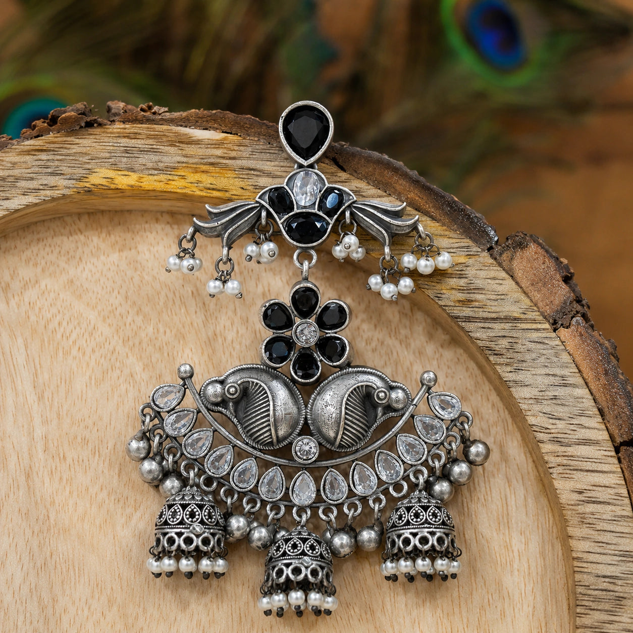 Alternate detail view of black pearl-style chandelier earrings
