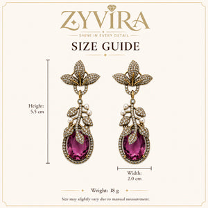 Close-up of purple crystal-style accents and antique leaf detailing