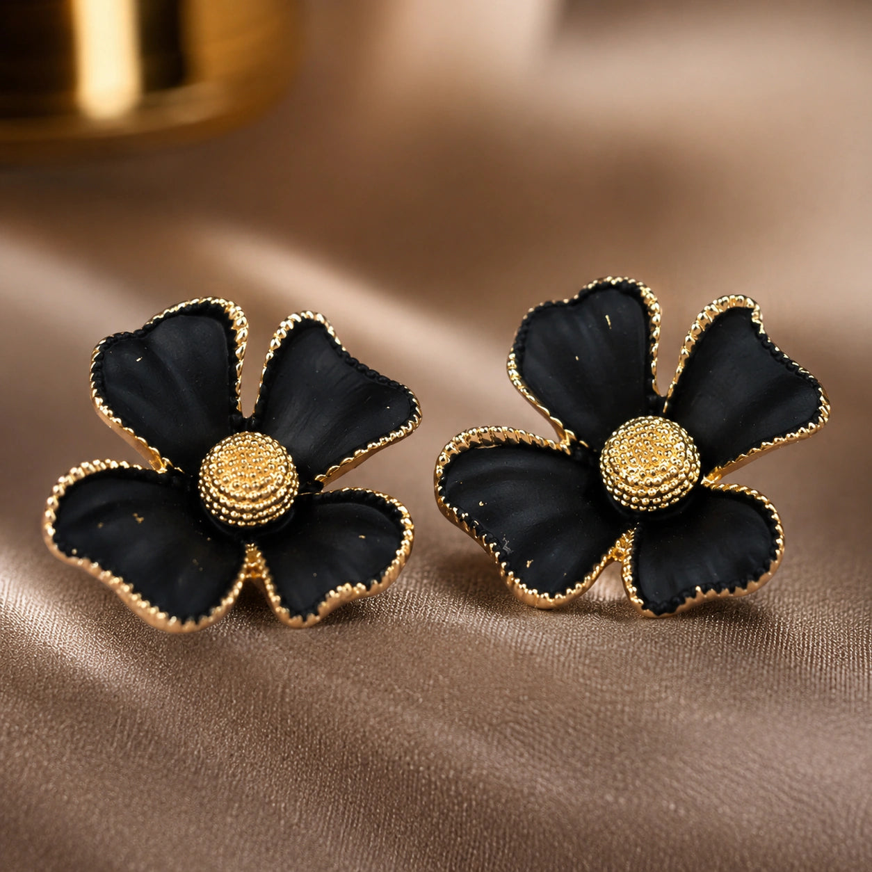 Alternate detail view of black gold floral statement earrings