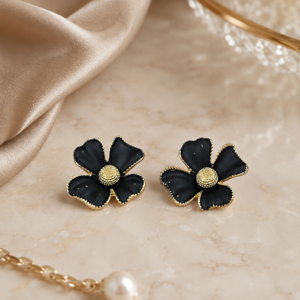 Alternate product view of black gold floral statement earrings