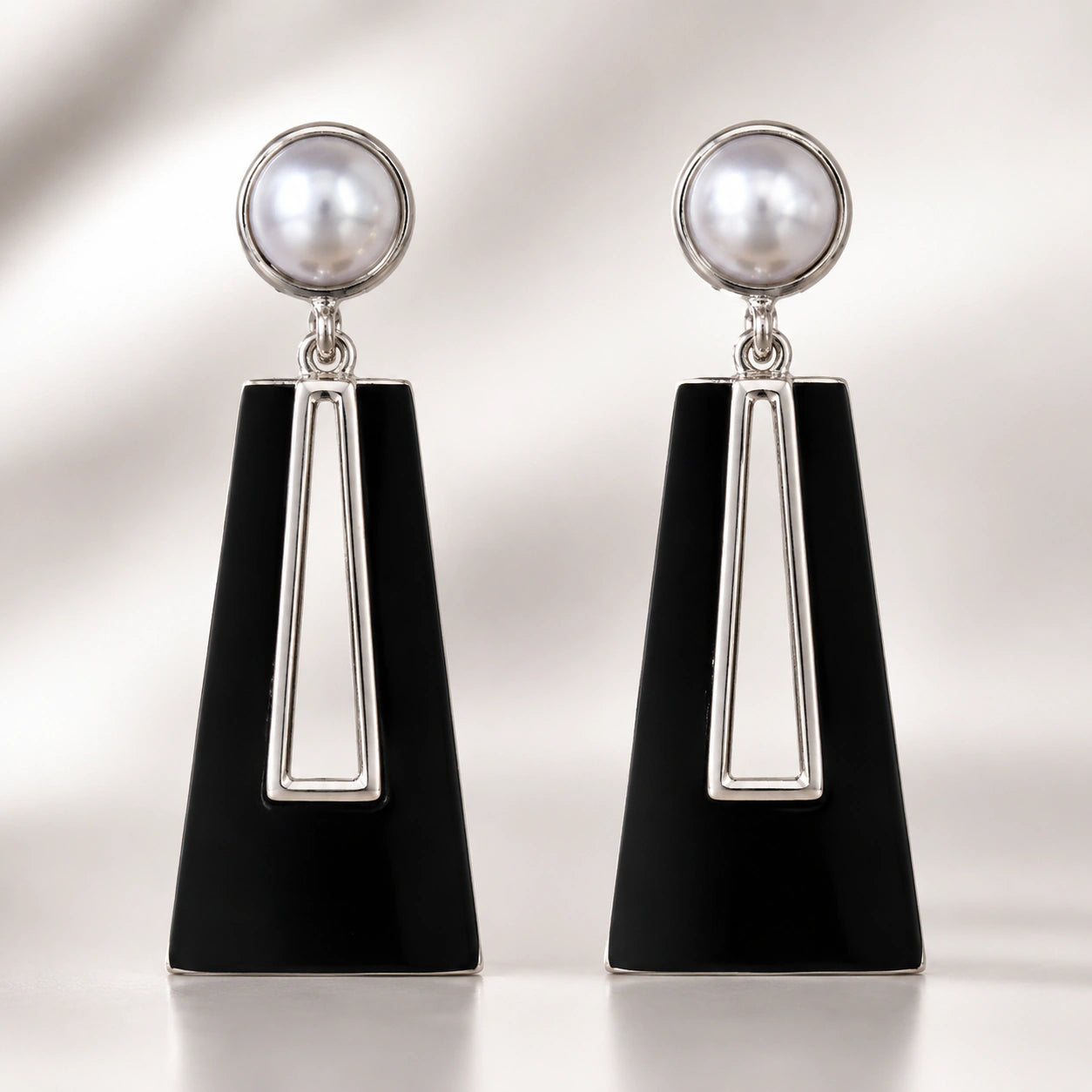 Western black pearl-style geometric dangle earrings