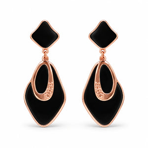 Close-up of black geometric elements and rose-gold finish