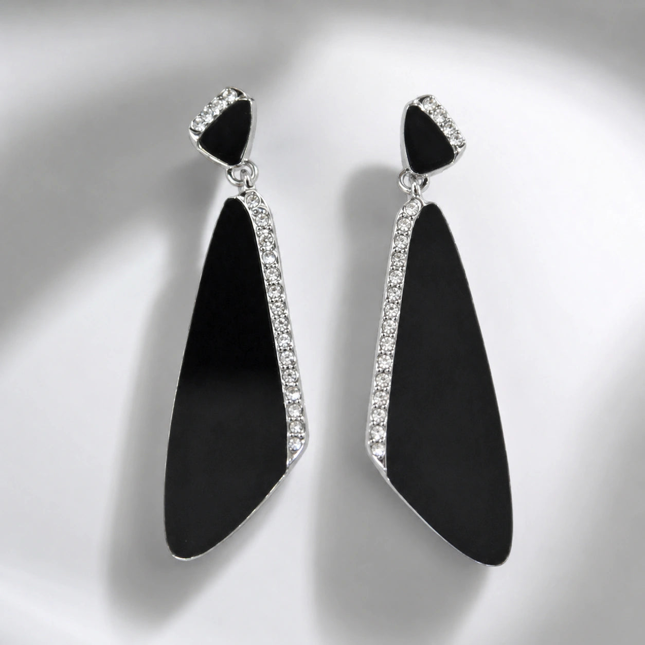 Close-up of black geometric panels and silver crystal-style detailing