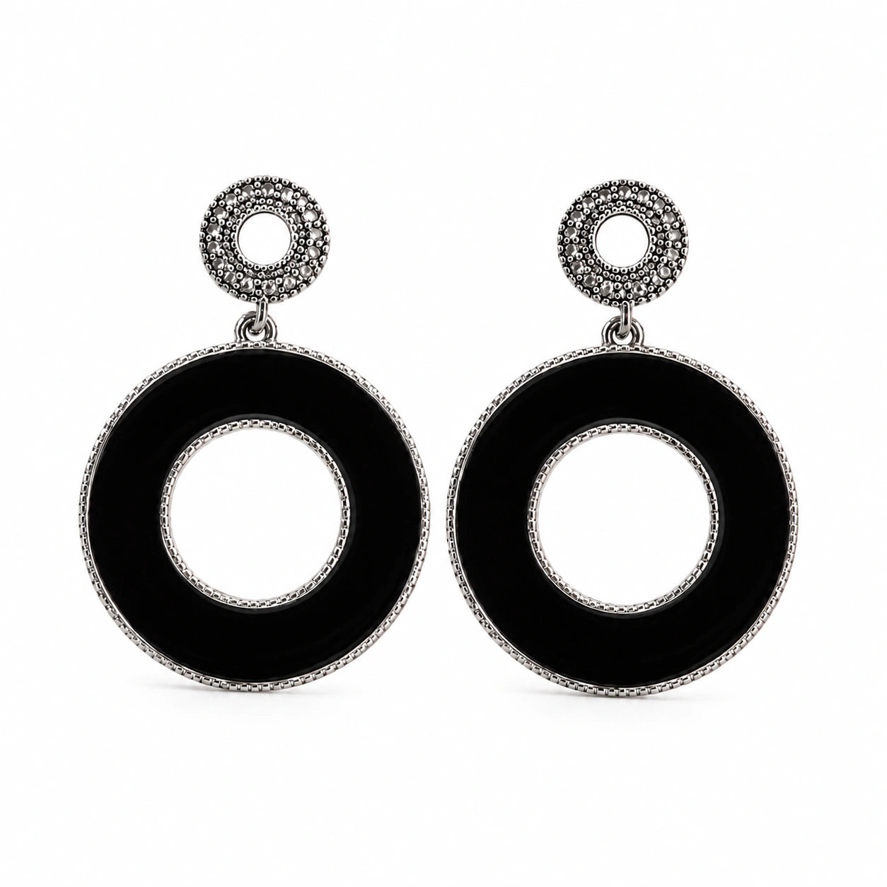 Close-up of black silver panels and open-centre hoop detailing