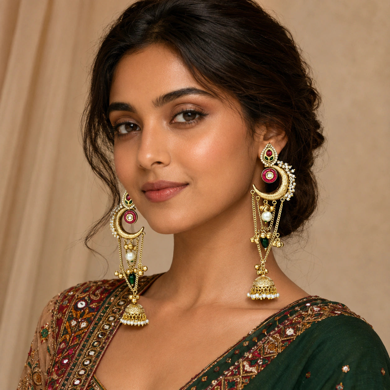 Close-up of Kundan-style stones, pearl accents and brass-gold chandbali jhumka detailing