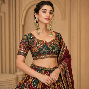 Brass-gold Kundan pearl chandbali jhumka statement earrings worn by a model