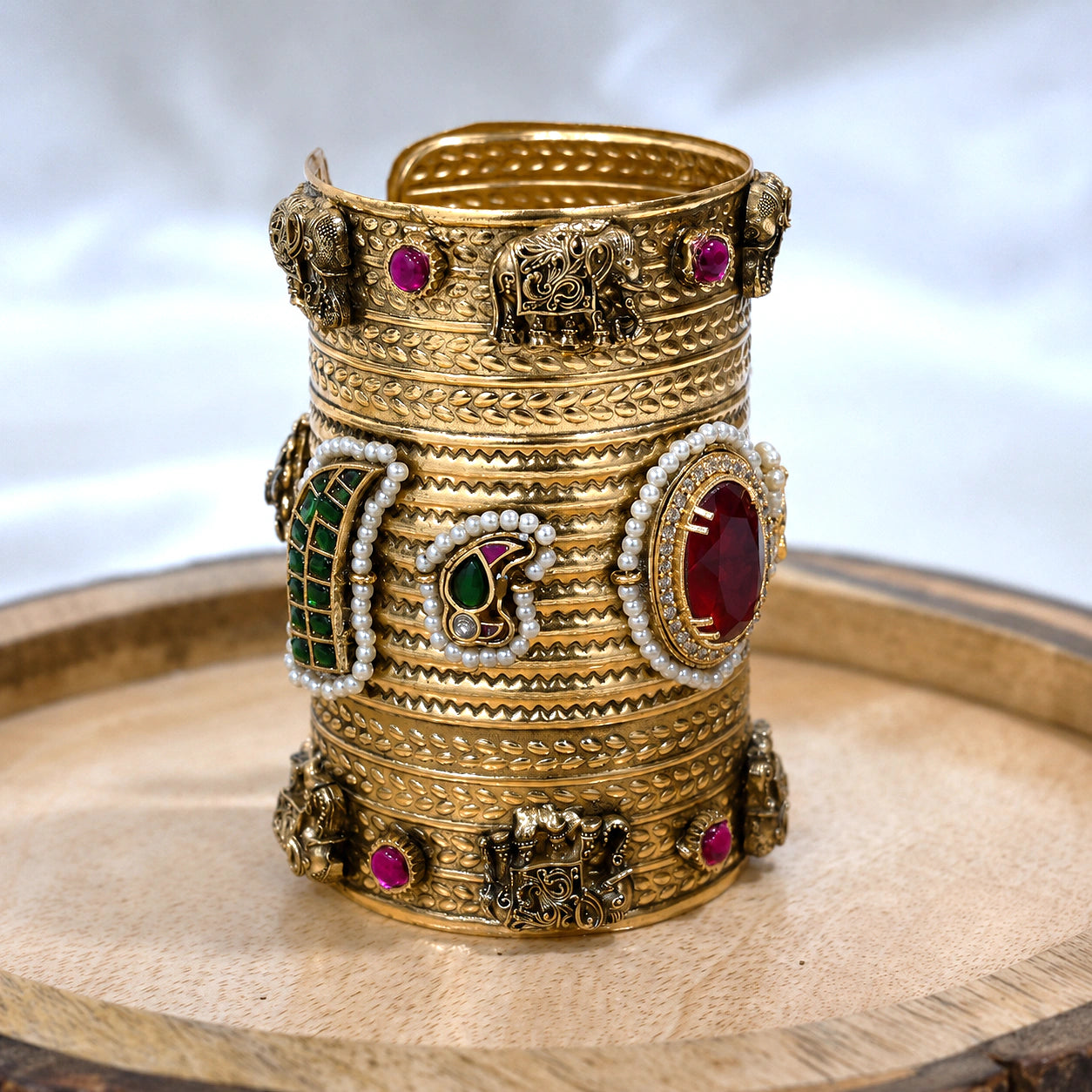 Alternate product view of the elephant-motif red Kundan kada