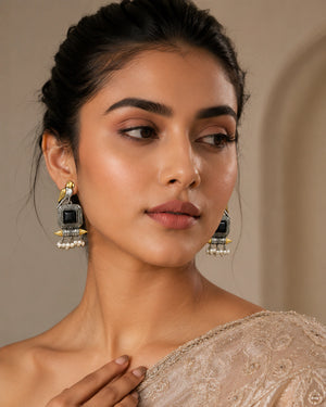 Alternate model view of black-stone bird pearl-style dangle earrings