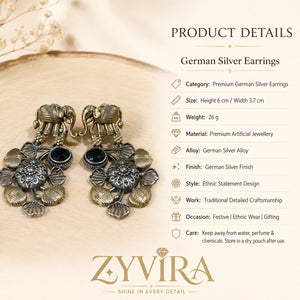Product details card for German silver elephant black-stone chandelier earrings