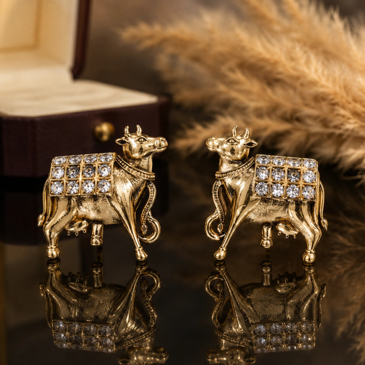 German silver gold cow-motif crystal drop earrings