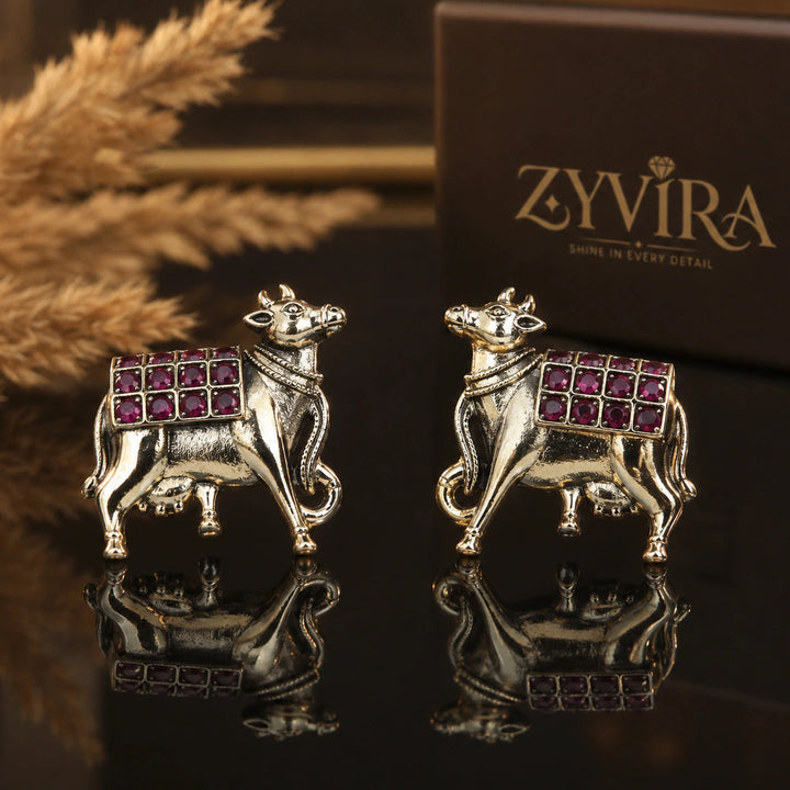 German silver gold-tone maroon-stone cow-motif dangle earrings