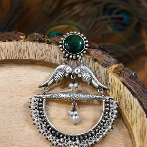 Alternate detail view of green bird pearl chandelier earrings
