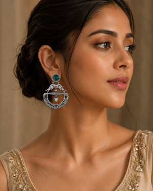 German silver green bird pearl chandelier earrings worn by a model