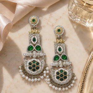 Alternate detail view of green pearl peacock chandelier earrings