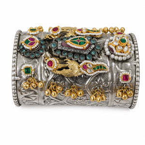 Close-up of multicolor Kundan stones and German silver handwork detailing