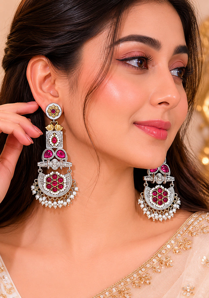 German silver maroon pearl chandelier earrings worn by a model