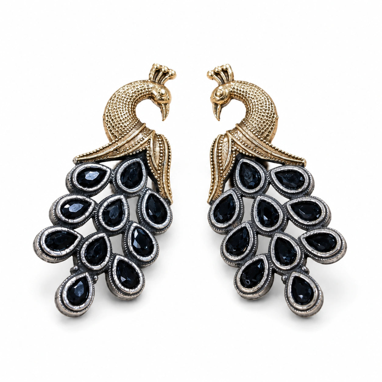 Close-up of navy crystal-style stones and antique peacock chandelier detailing