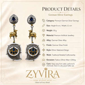 Product details card for German silver navy pearl cow chandelier earrings