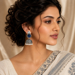 Close-up of navy blue accents, pearl-style beads and dome jhumka detailing