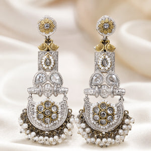 Angled view of German silver pearl-style crystal chandelier earrings