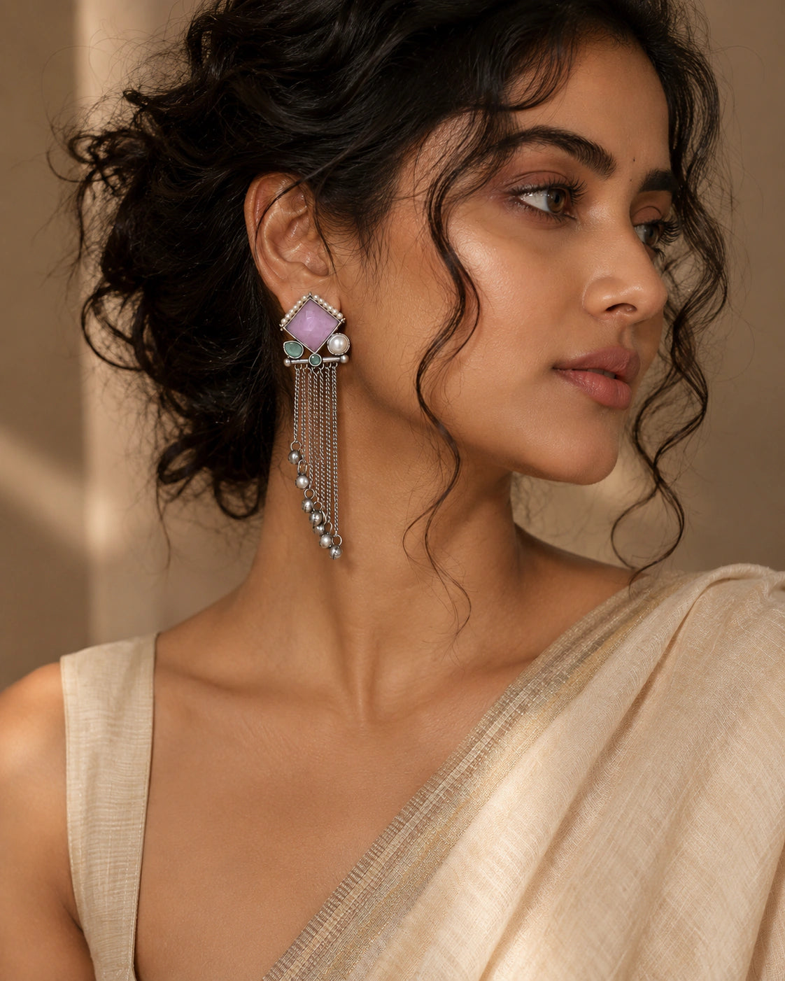 German silver pink pearl-style dangle earrings worn by a model