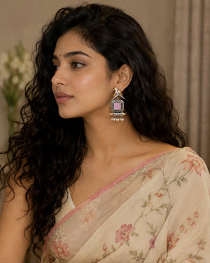 German silver pink-stone bird pearl dangle earrings worn by a model