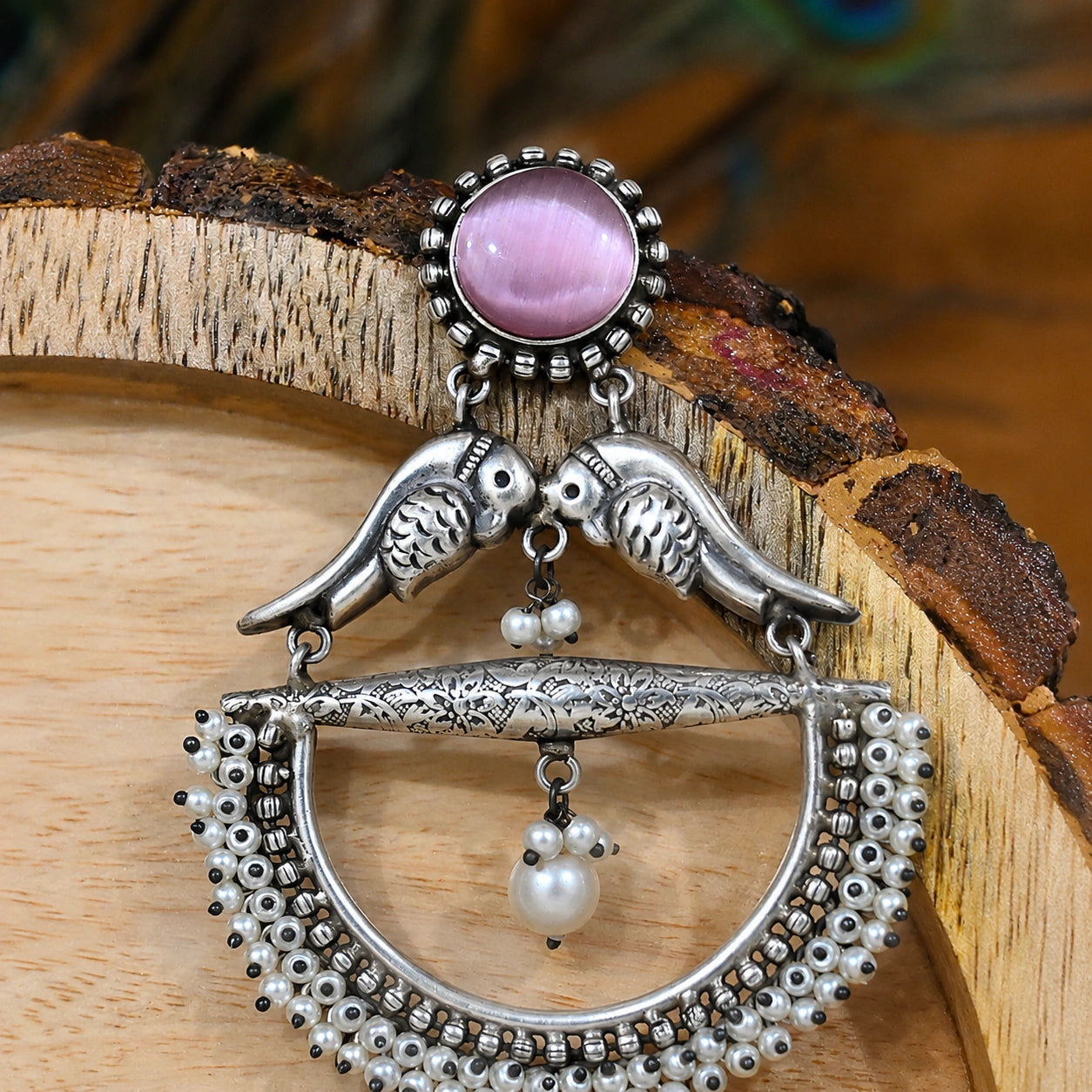 Alternate product view of German silver purple bird pearl chandelier earrings