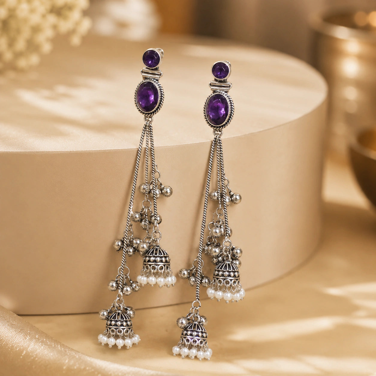 Product details card for German silver purple pearl chandelier earrings