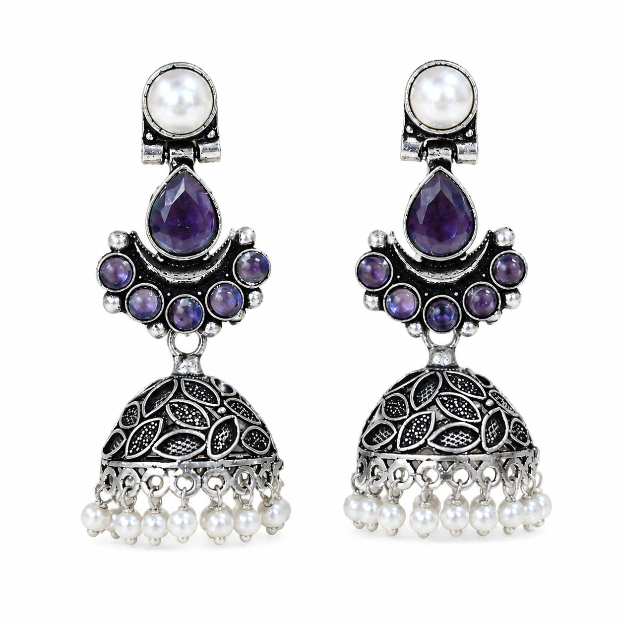 Close-up of purple stones, leaf motifs and pearl-style dome jhumka detailing