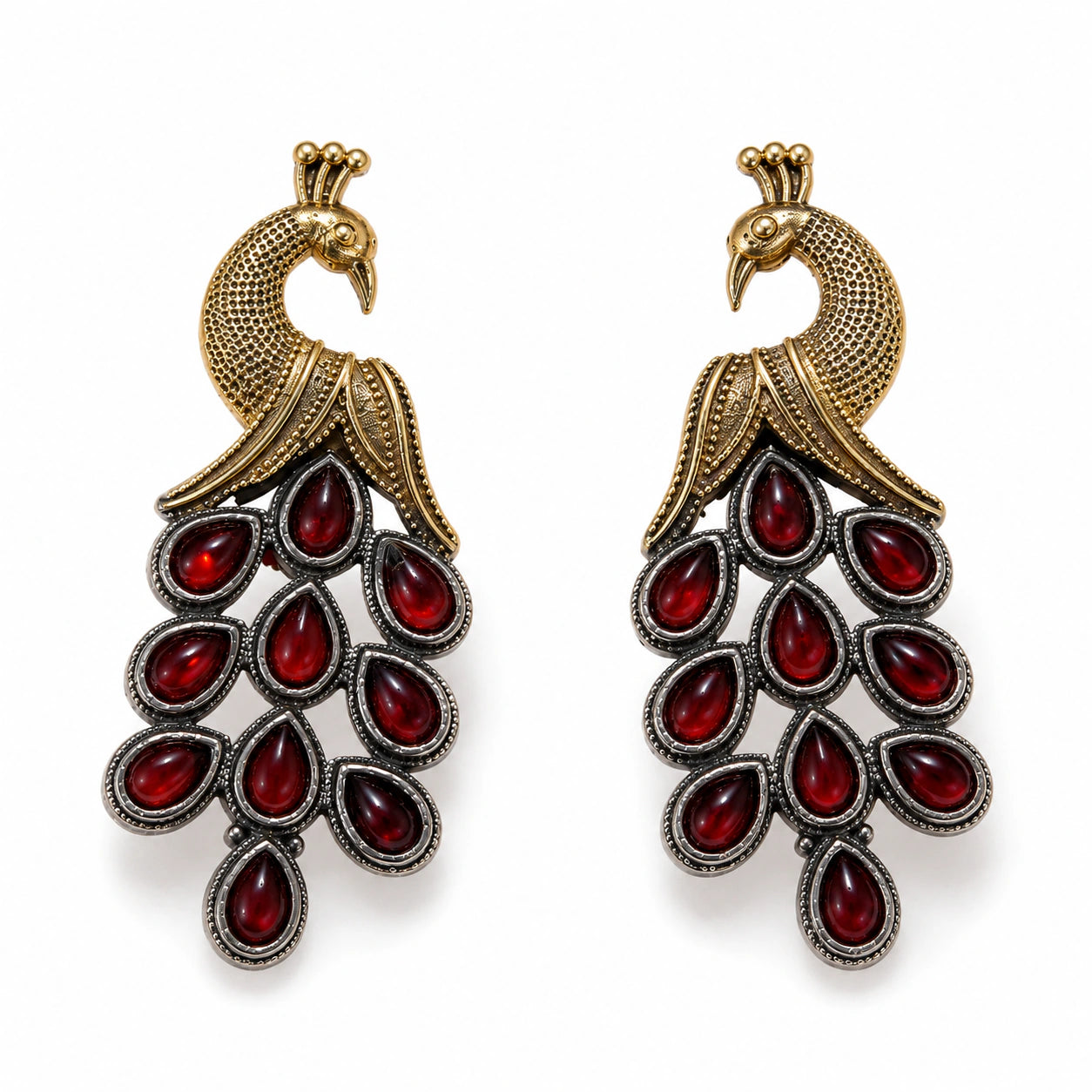 Close-up of red stones and antique-finish peacock chandelier detailing