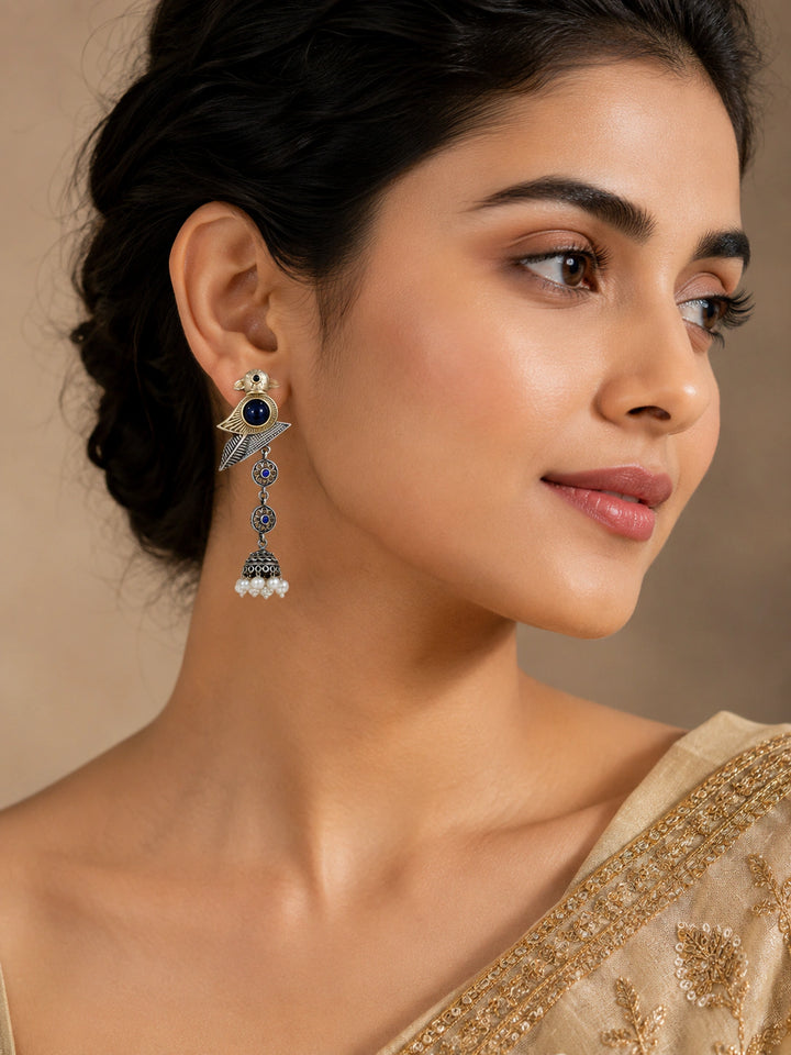 German silver sparrow pearl dangle earrings worn by a model