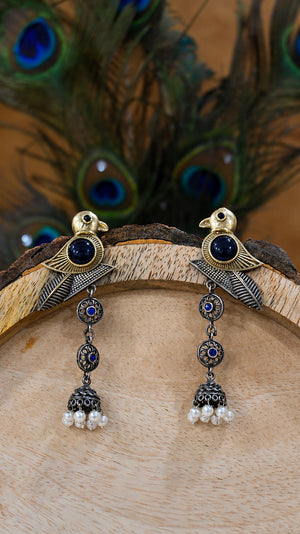Close-up ear view showing the sparrow motif and pearl-style jhumka drops
