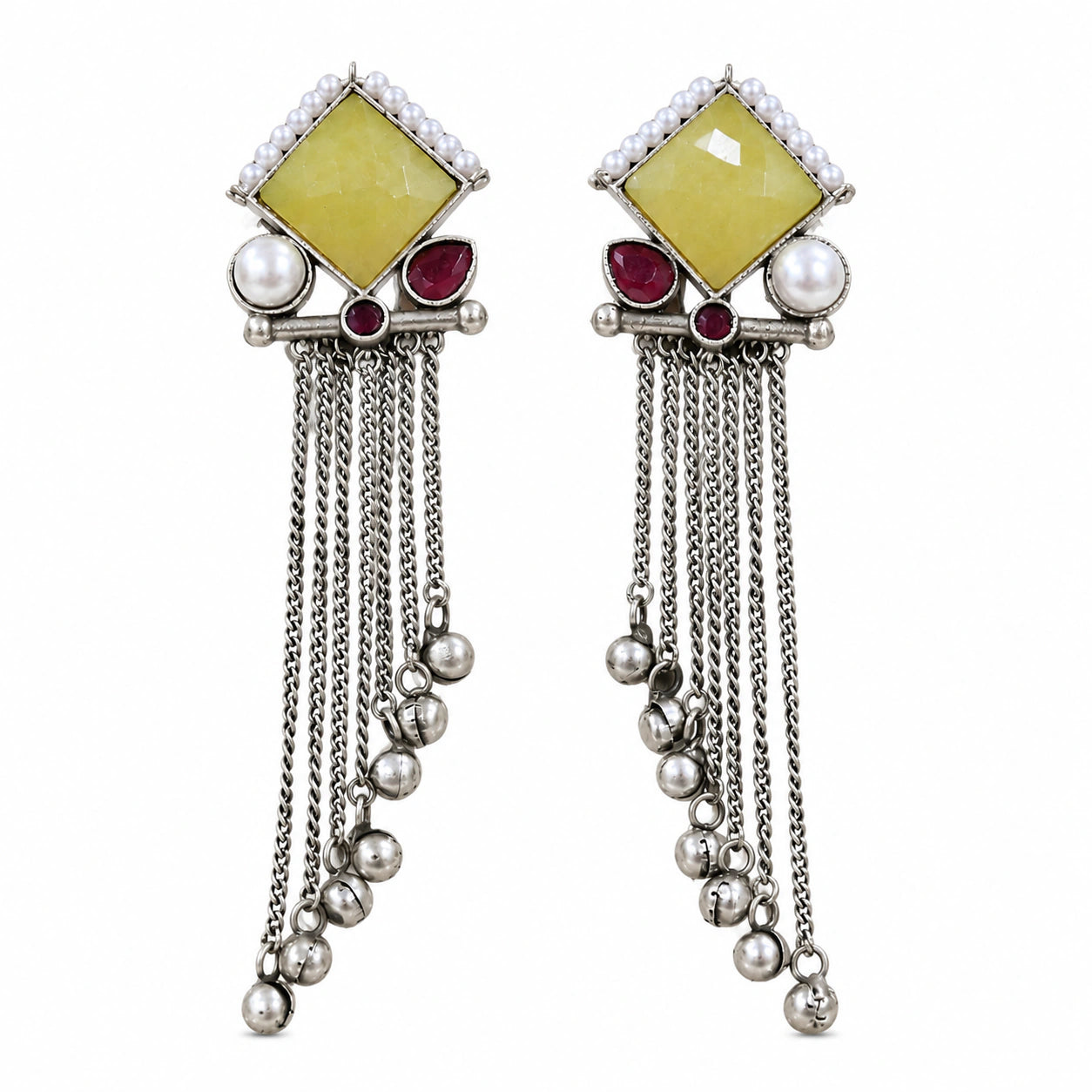 Angled view of German silver yellow and maroon pearl-style fringe earrings