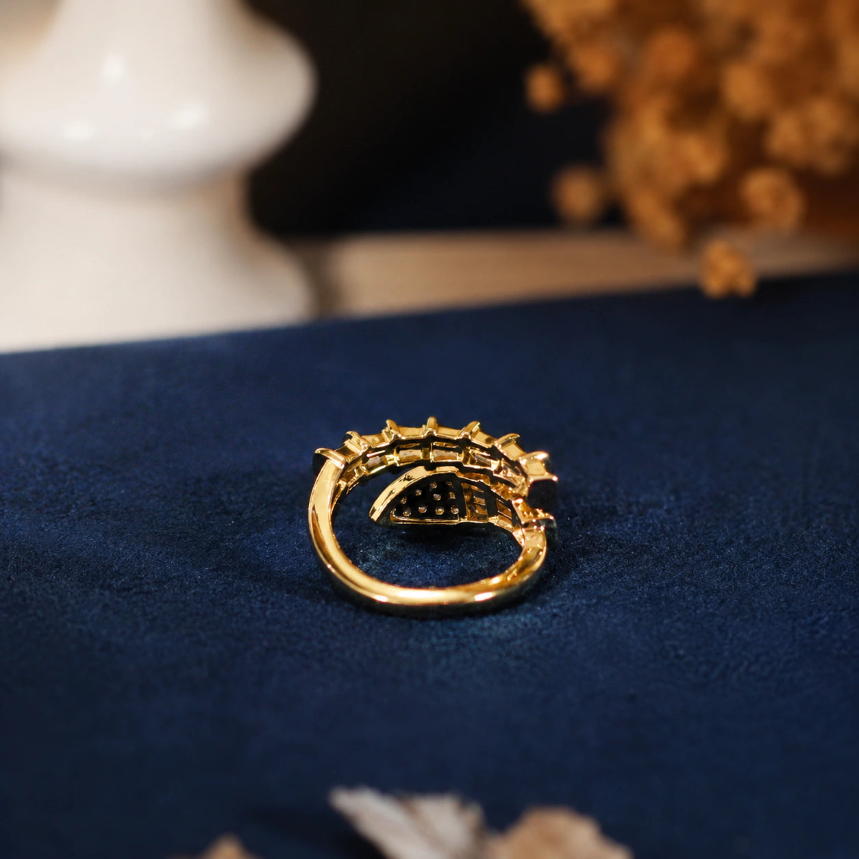 Side view of the gold baguette crystal wrap ring