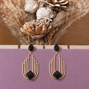 Alternate detail view of black geometric dangle earrings