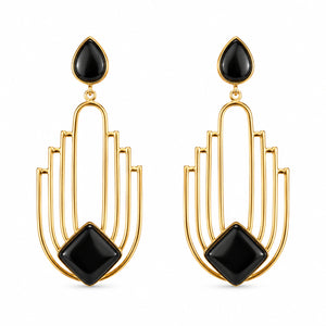 Close-up of black geometric panels and gold-tone detailing