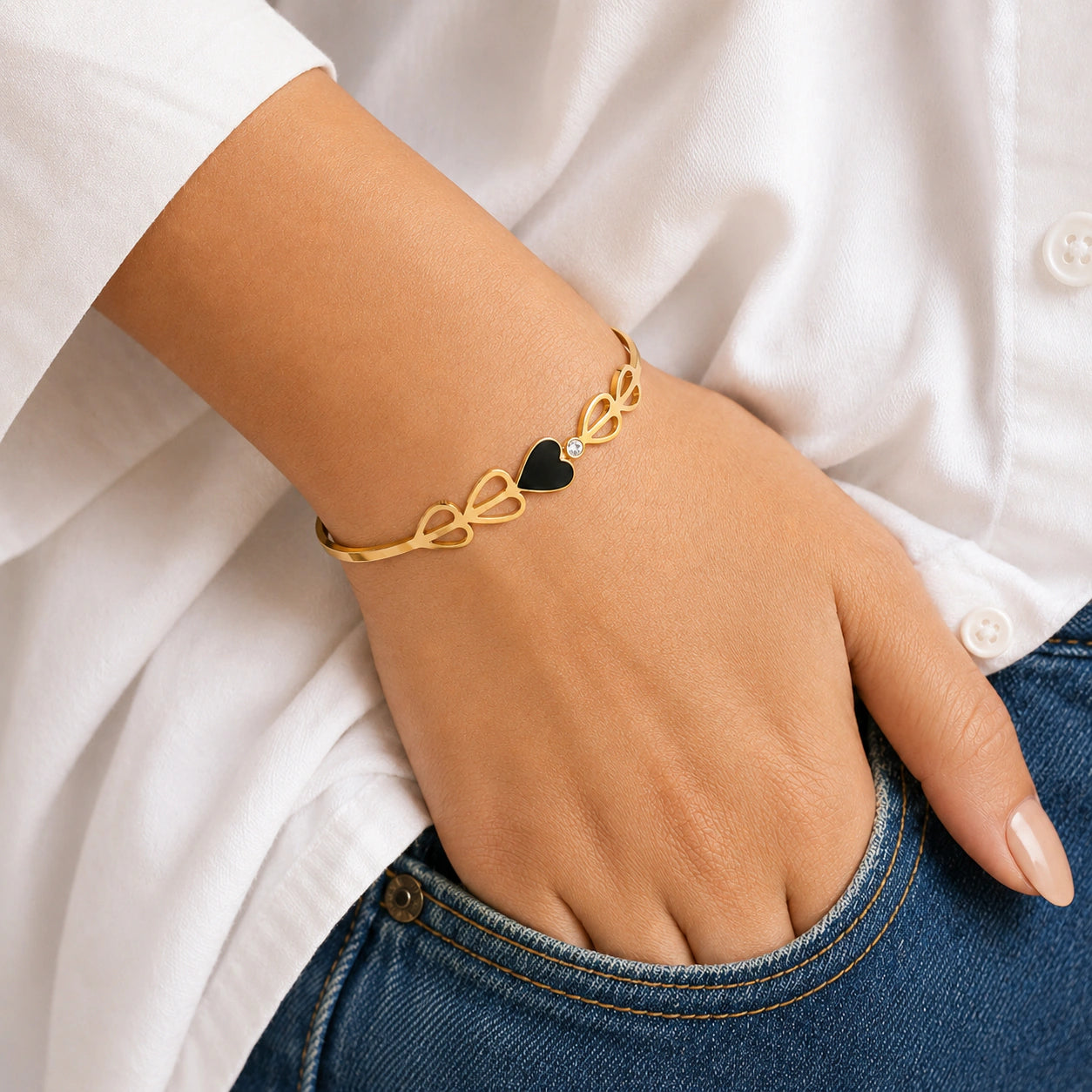 Alternate product view of the gold black-heart crystal cutout kada