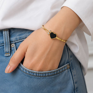 Alternate product view of the gold black-heart kada