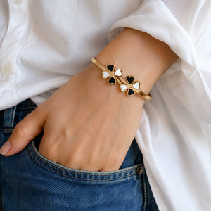 Side view of the gold black clover crystal kada