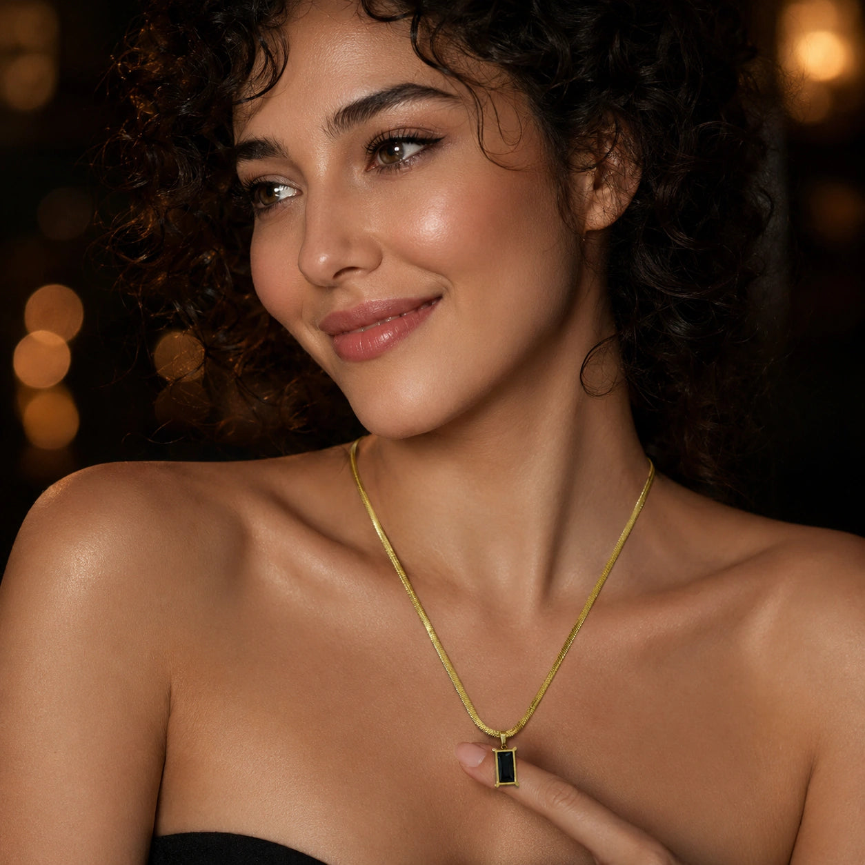 Alternate product view of the gold black stone necklace