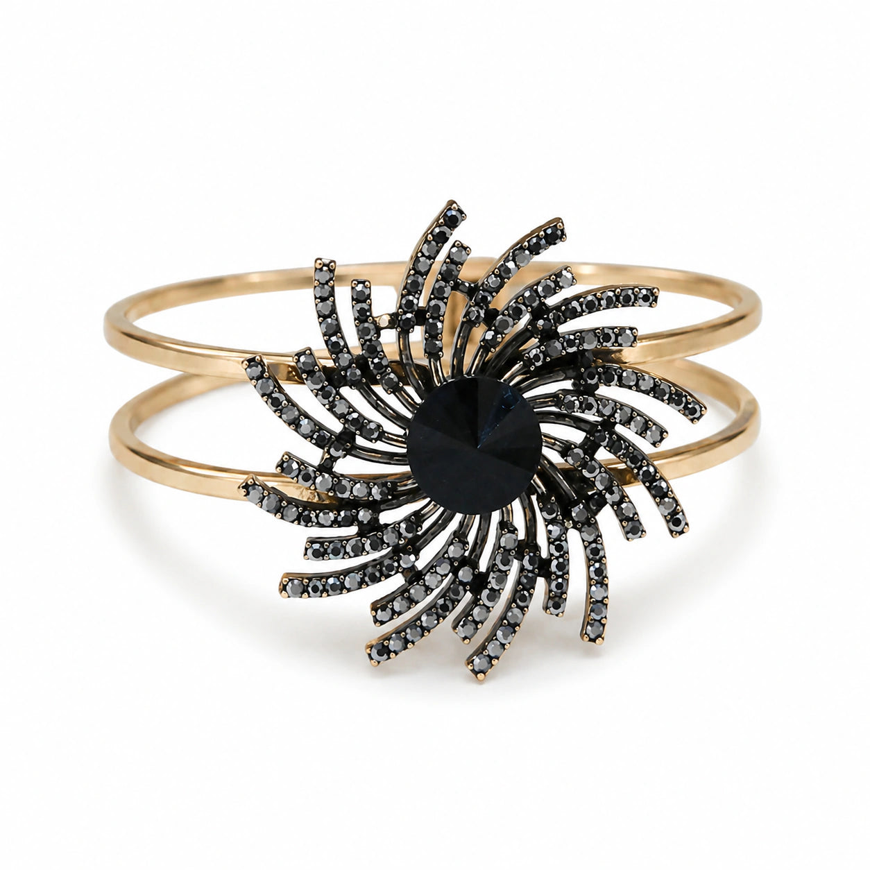 Gold black sunburst double-band kada on a dark jewellery studio display