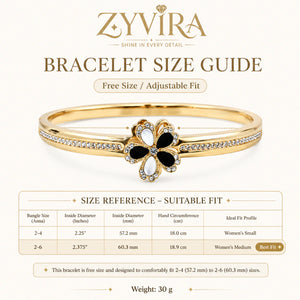 Angled view of the gold black and white floral crystal bracelet