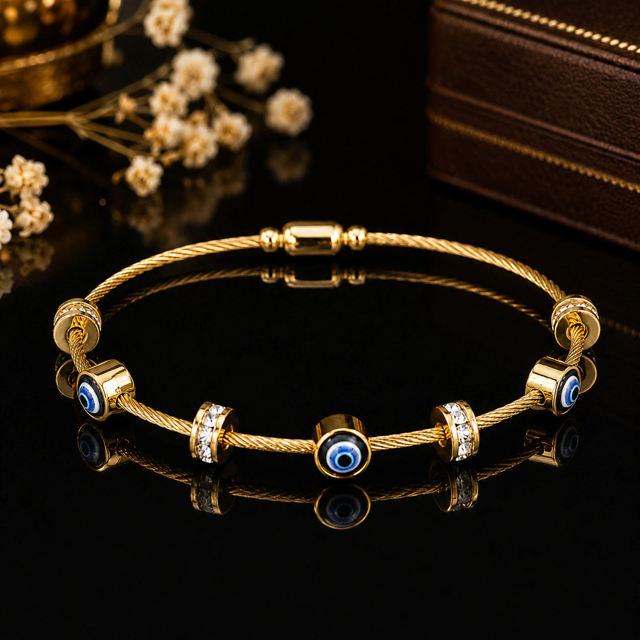 Alternate product view of the gold blue evil-eye bracelet