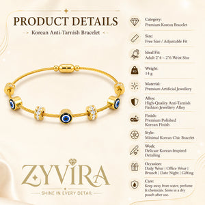 Gold blue evil-eye bracelet styled in an elegant jewellery flat lay