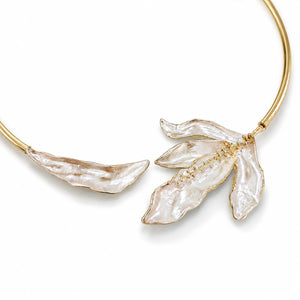 Angled view of the gold blush floral collar Hasali