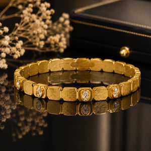 Gold-tone brushed link crystal-style kada bracelet