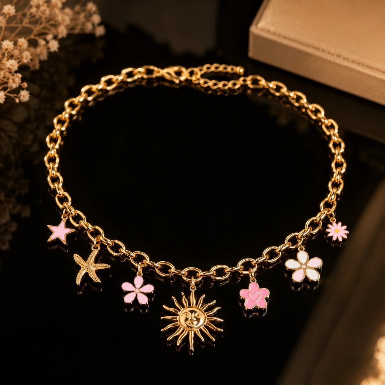 Angled view of the gold celestial floral charm necklace