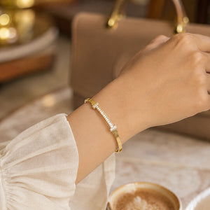 Alternate product view of the gold crystal-bar bangle