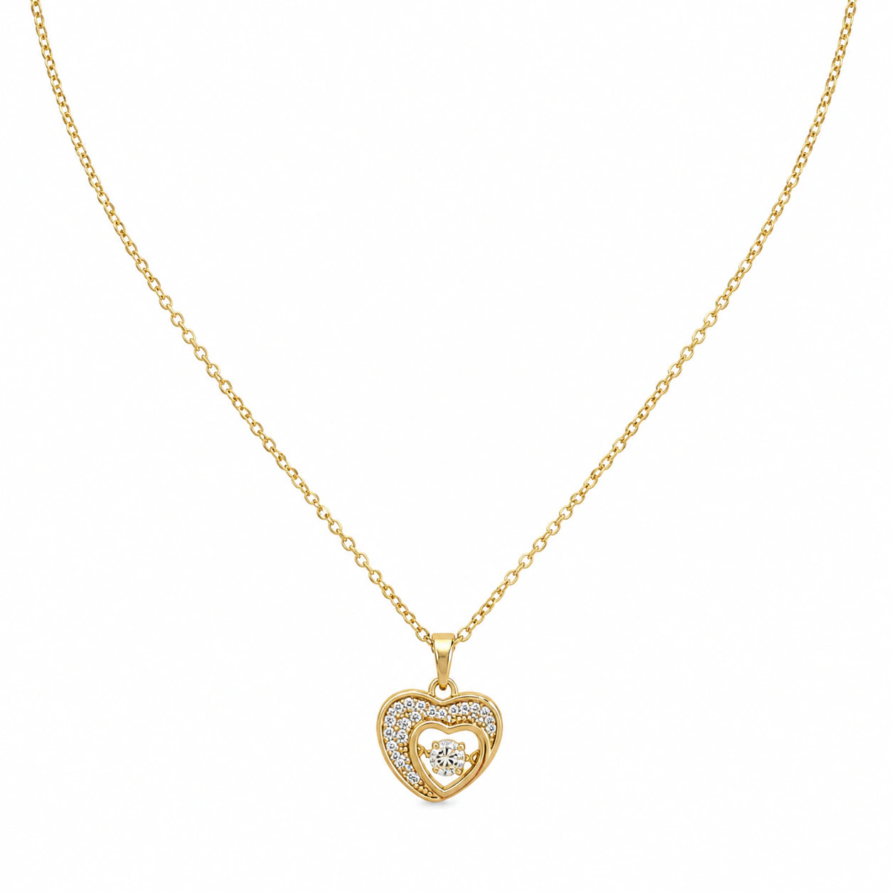 Close-up of the gold double-heart crystal pendant detailing